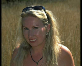 Dicke Frau am Strand