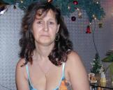 Reife Frau strippt privat