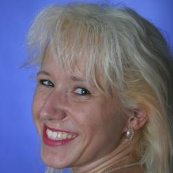 hei�e, sexy erfahren Frau posiert f�r die Kamera